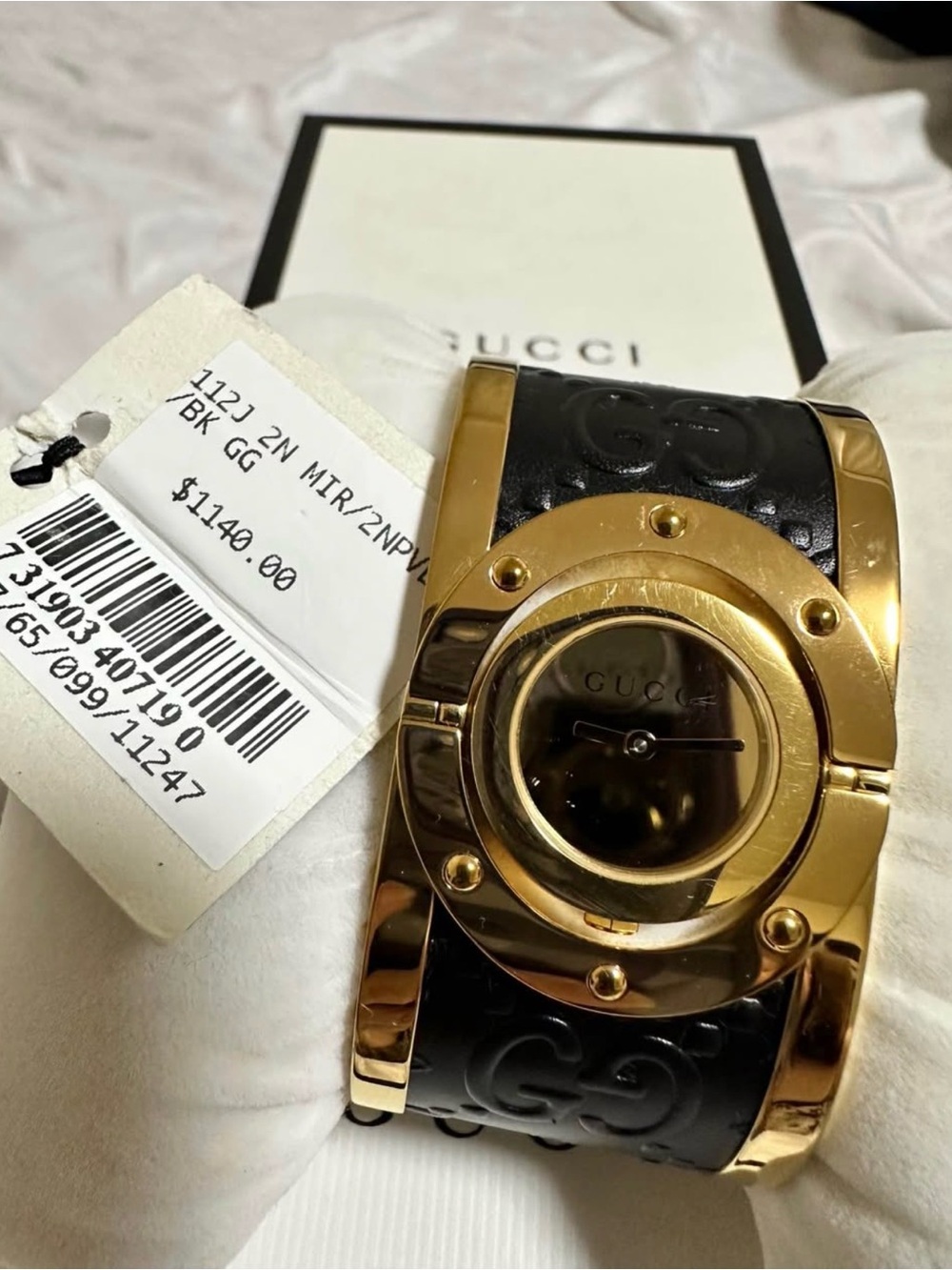 Gucci Black Embossed Leather Cuff Watch with Gold-Tone Case